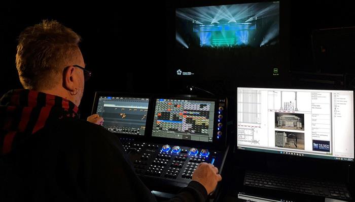3D laser previsualization software showing virtual venue setup and beam projections